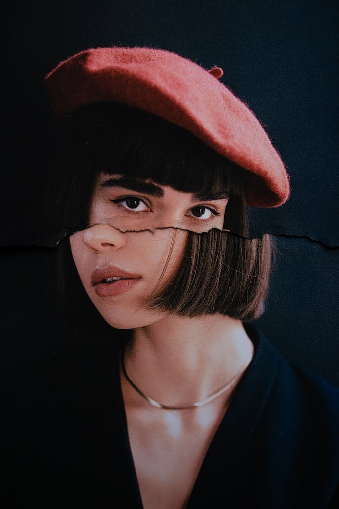 Artistic Photo Portrait of Young Brunette Woman in Pink Bonnet